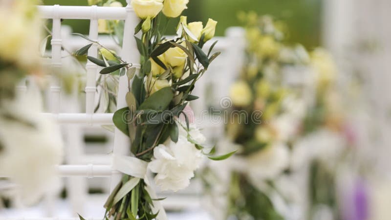 Decorated chairs for the wedding ceremony stock video