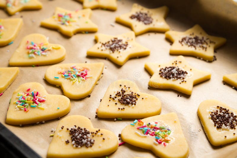 Decorated Christmas cookies ready for baking royalty free stock photo Decorated Christmas cookies ready for baking royalty free stock photo