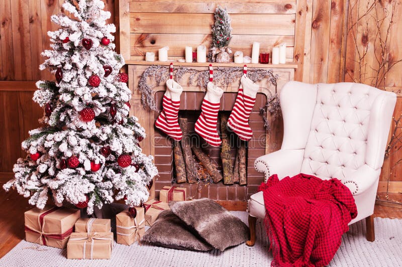 Decorated Christmas room with beautiful fir tree royalty free stock images Decorated Christmas room with beautiful fir tree royalty free stock images