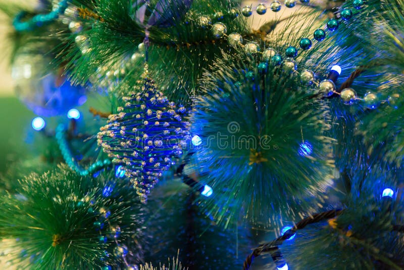 Decorated Christmas Tree with Blue Lights. White Christmas Ball and