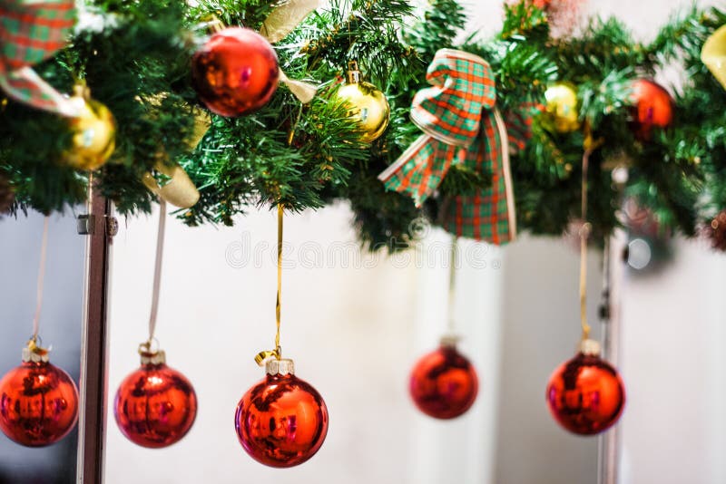 Decorated Christmas Tree Garland With Red Balls And Bows Stock Image