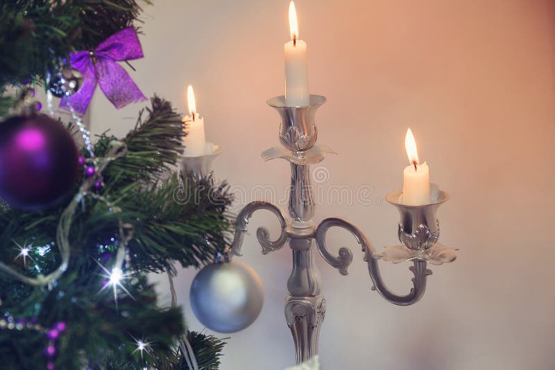 Decorated Christmas Tree and Lit White Candlesticks Stock Photo Image