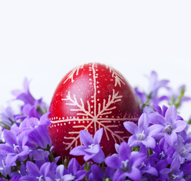 Decorated easter egg with spring flowers stock photo