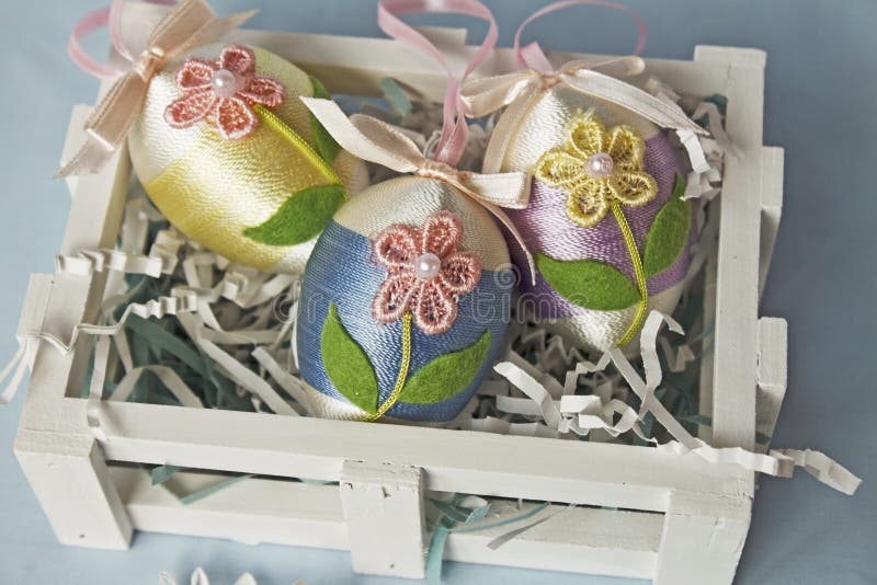 Decorated Easter eggs in a crate stock images Decorated Easter eggs in a crate stock images