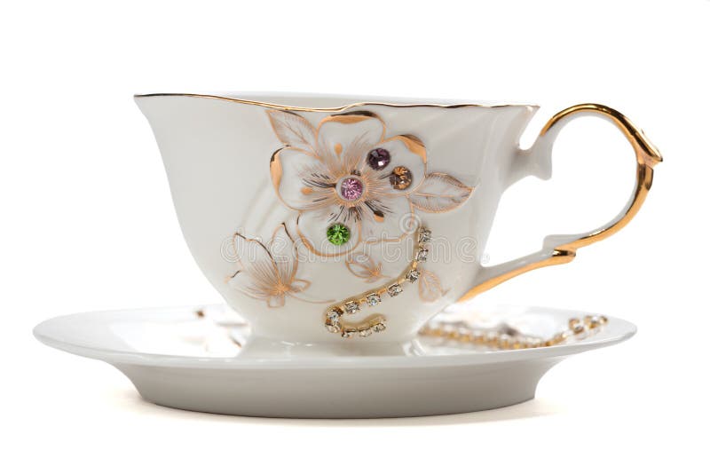 Decorated White Tea Cup and Saucer. Isolated Stock Photo Image of