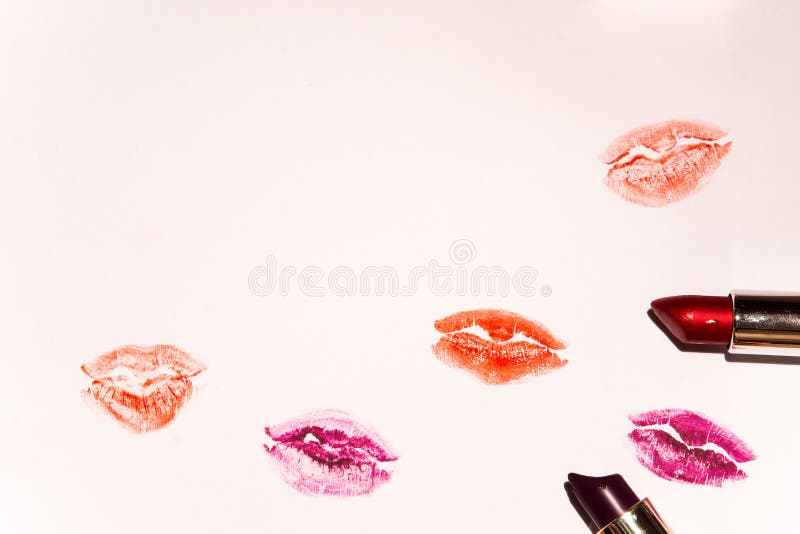 Lipstick and red and pink colorful lipstick marks on a white paper stock images Lipstick and red and pink colorful lipstick marks on a white paper stock images