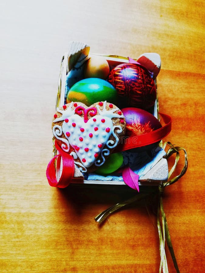 Decoration of Colored Easter Eggs,Easter Basket Filled with Hand