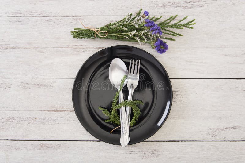 Decoration Dinner Plate Setting on Wood Table Top View Stock Photo
