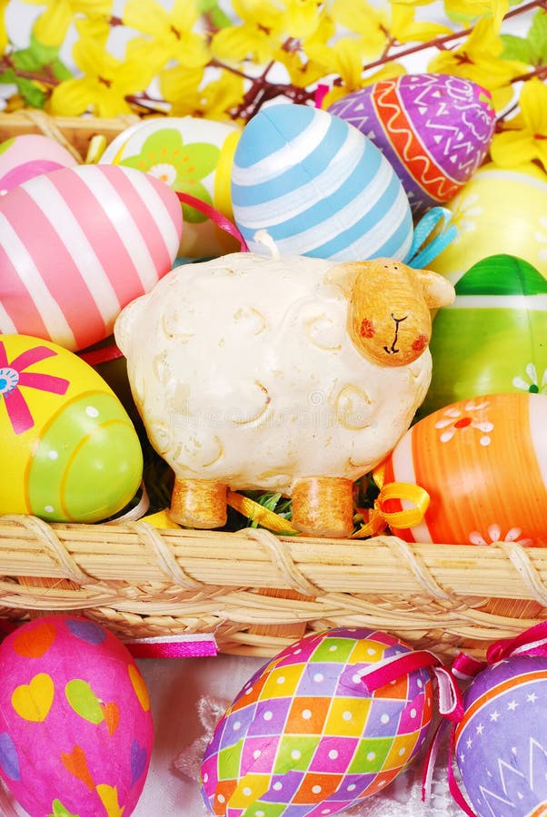 Decoration with Easter Painted Eggs and Sheep Figurine Stock Photo