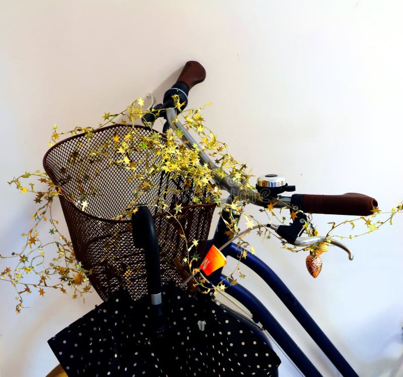 Decoration on the Handlebars and Basket of the Bicycle, with an
