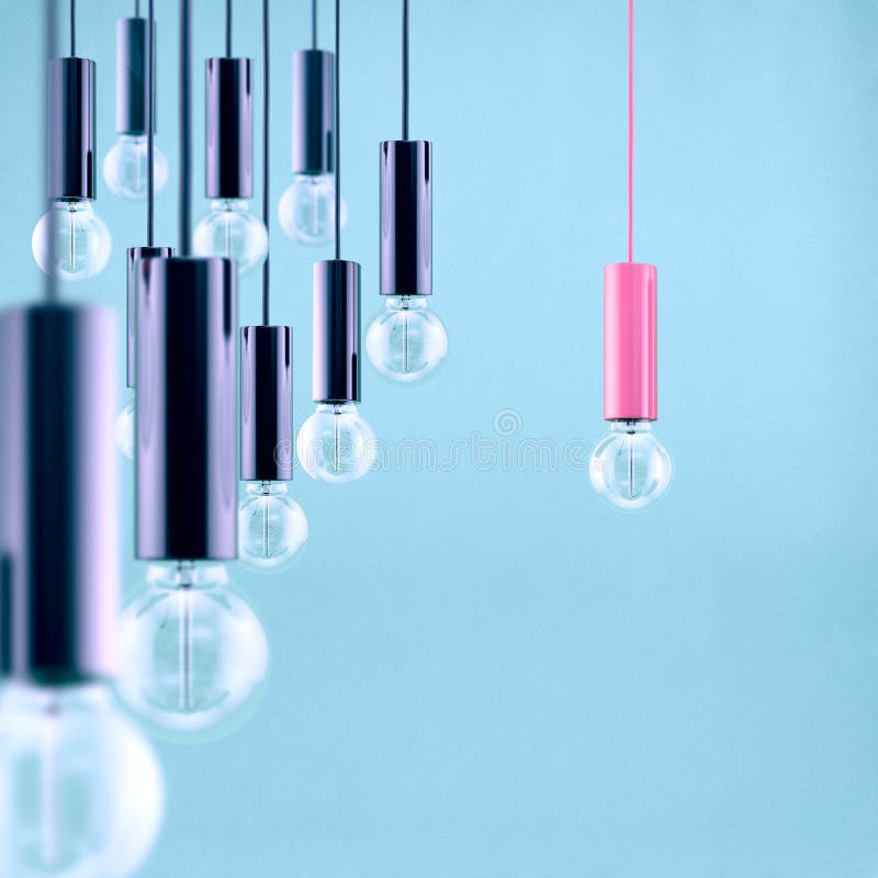 Decorative antique edison style filament light bulb on light blue background. Filtered image. Concept f retro style stock images, royalty-free photos and pictures