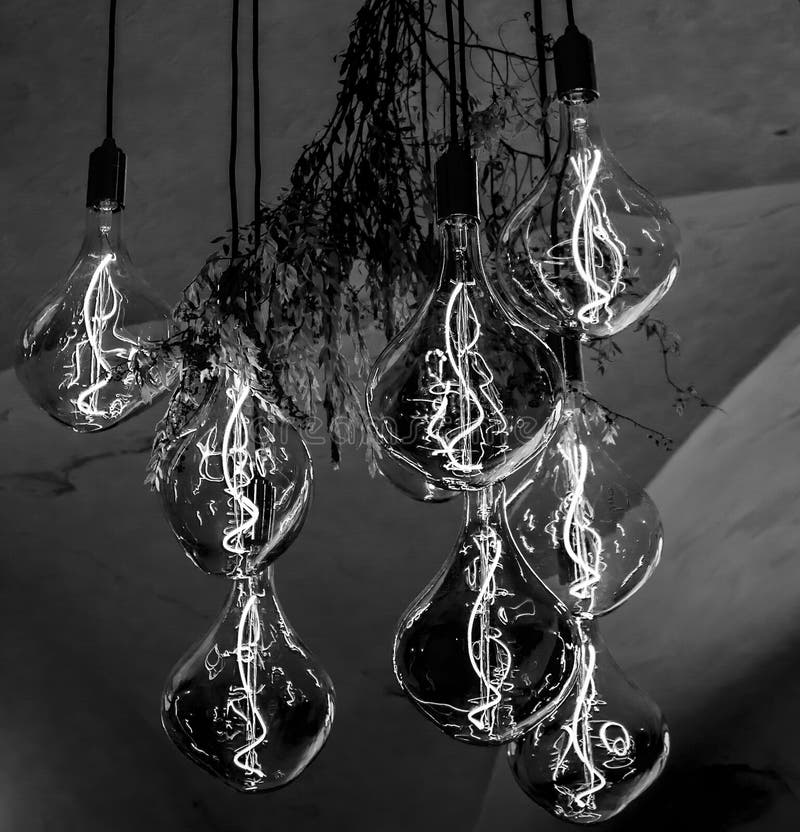 Decorative Antique Edison Style Filament Light Bulbs Hanging from the Ceiling Stock Photo