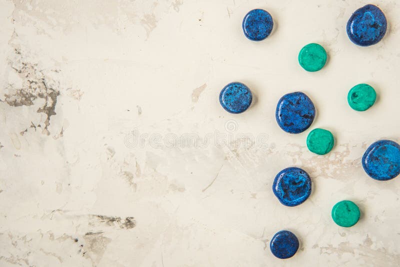 Decorative Blue Stones on a Light Background, Copy Space Stock Photo