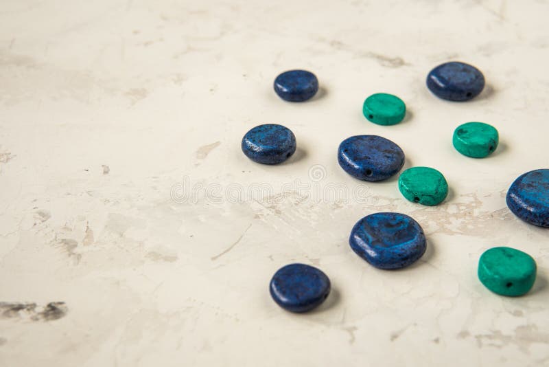 Decorative Blue Stones on a Light Background, Copy Space Stock Photo