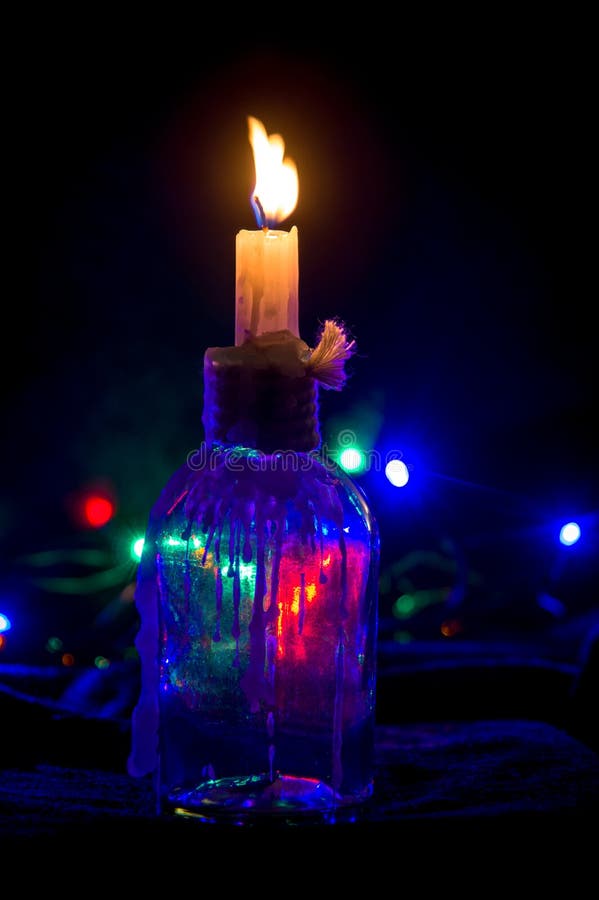 Decorative Candle Holder with Lighted Candle Inside. Stock Photo