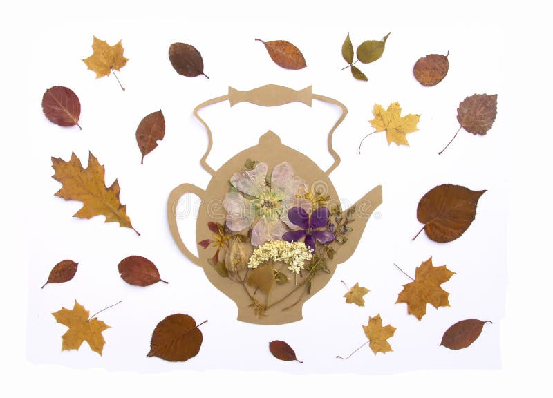 Decorative Composition of Handmade Paper Teapot and Fall Dry Leaves on
