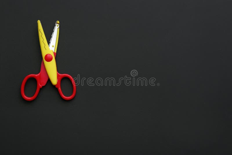 Decorative Edge Scissors On Dark Background Space For Text Stock