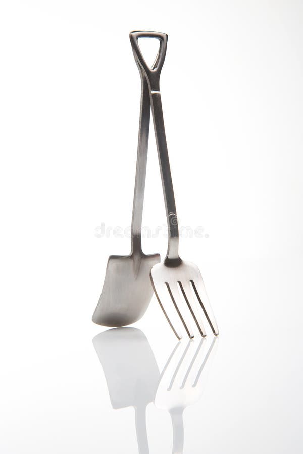 Decorative Fork and Spoons in the Form of Spades on a White Background