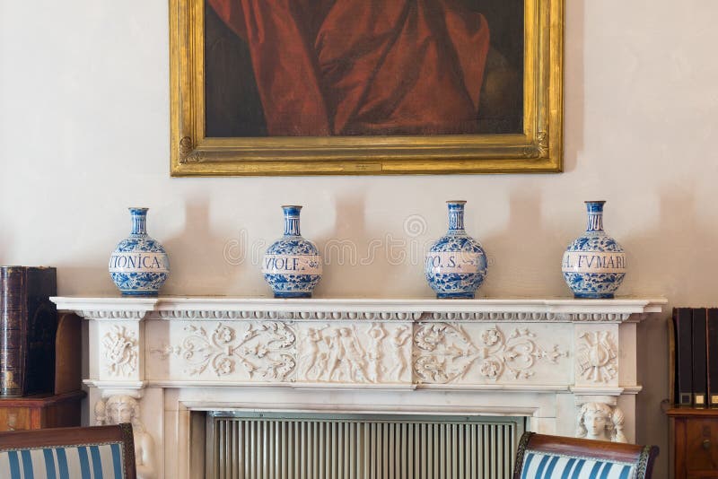 Decorative Handmade Porcelain Vases over a fireplace sill royalty free stock photography