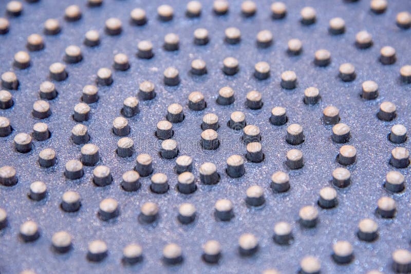 Decorative Iron Plate with Wooden Dots on it As an Abstract Back Stock