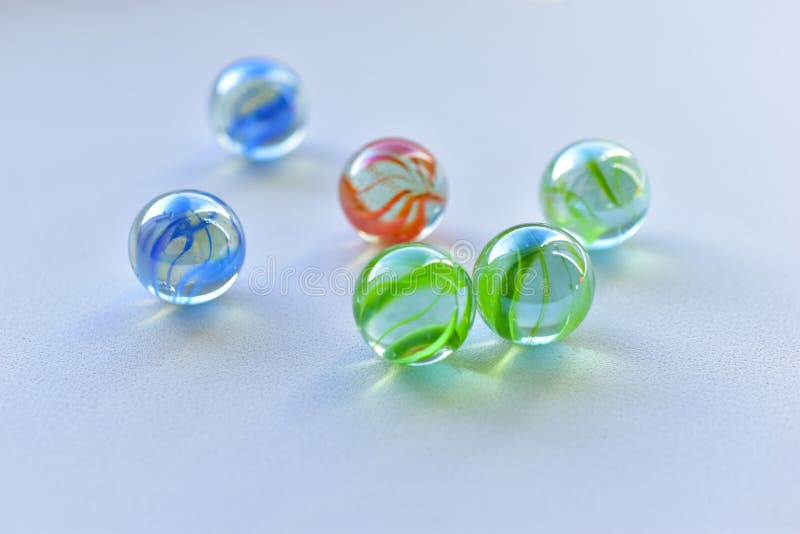 Decorative multicolored glass balls on a white background royalty free stock images