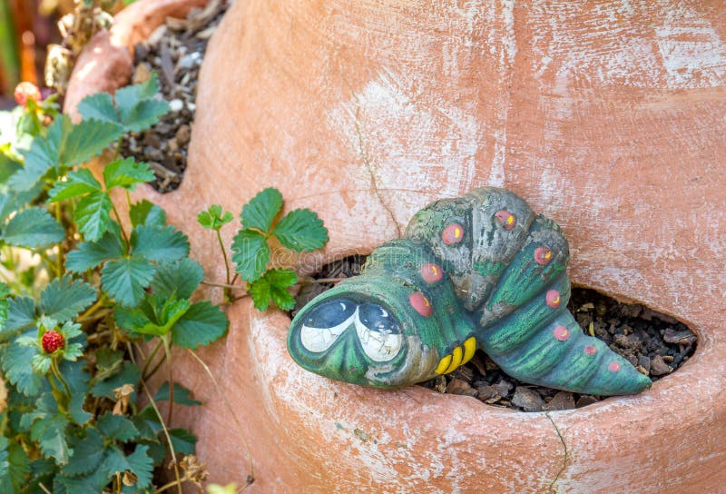 Worm on a flower stock image. Image of garden, purple - 205887461