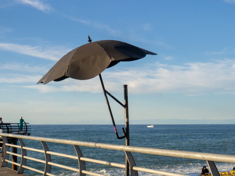 Decorative Parasol on the Bridge Railing. Metal Umbrella Stock Image