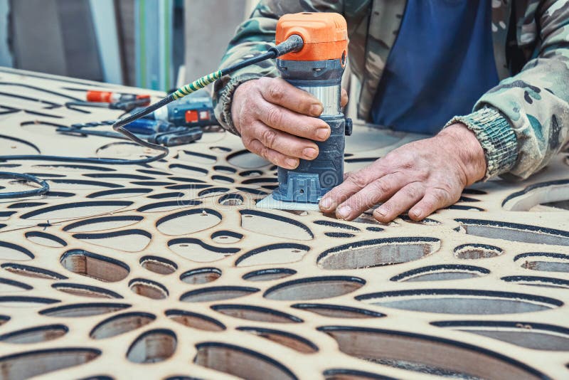 Decorative Partition Wall with Floral Pattern. Carpenter Milling Holes
