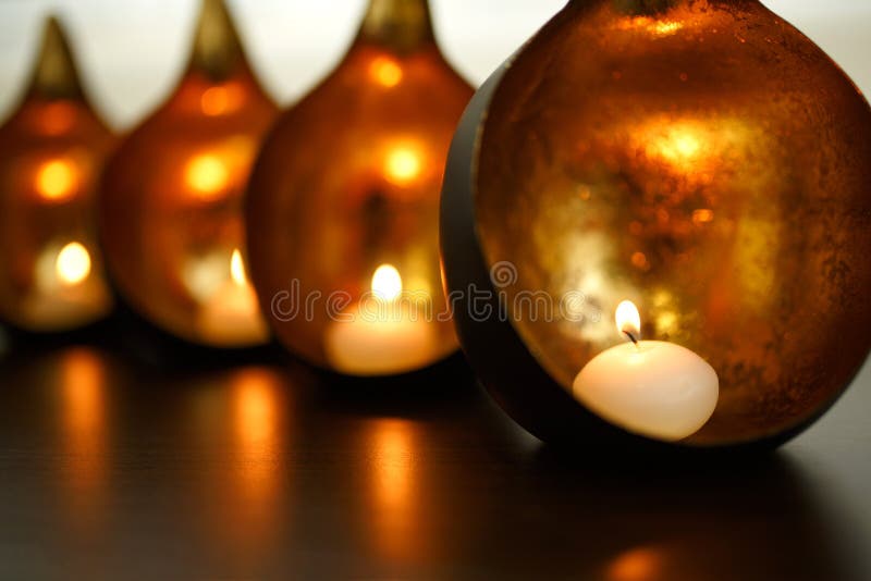 Decorative Round Copper Candlestick with Burning Candles Inside Stock