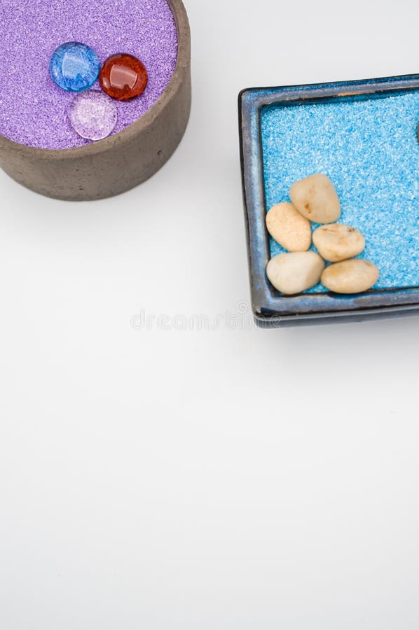 Decorative Vases with Colored Sand and Pebbles on a White Backgr Stock