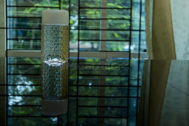 A Decorative Water Bottle on the Table Stock Photo Image of
