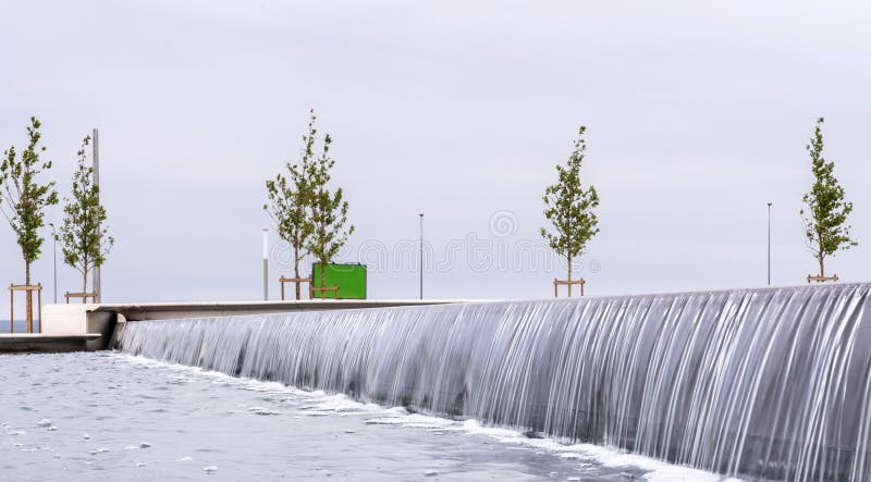 Decorative waterfall in big fountain. Selective focus. Fountain waterfall clear stock images, royalty-free photos and pictures