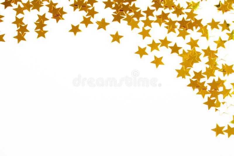 Golden confetti stars against white background as christmas decoration. Golden confetti stars against white background as christmas decoration