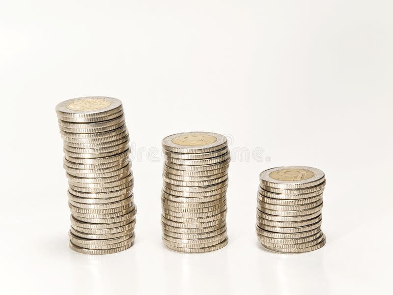 Three coin towers ina a row isolated on a white background. Decrease grow stock images, royalty-free photos and pictures