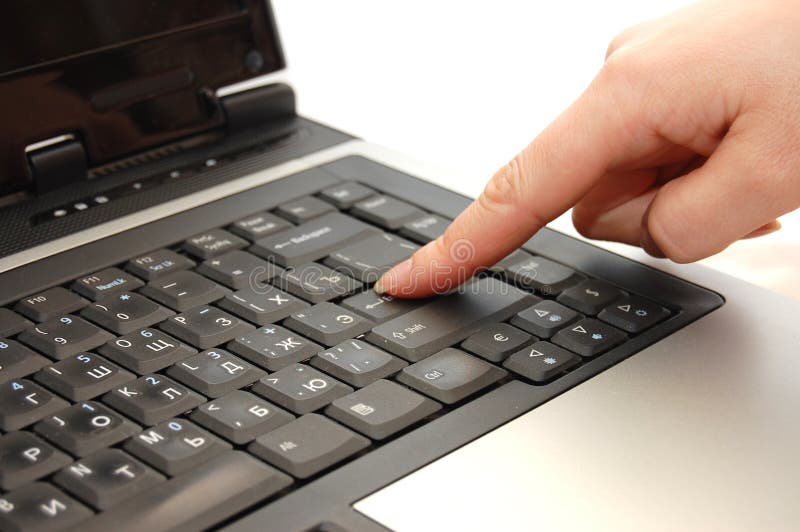 Finger typing on a laptop - press enter. Finger typing on a laptop - press enter