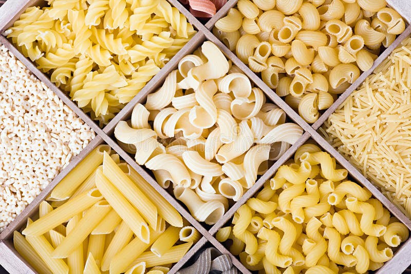 Italian pasta assortment of different colors background. Italian pasta assortment of different colors background