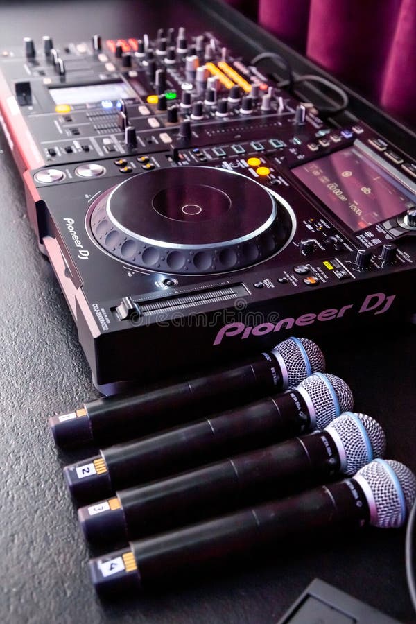 Deejay mixing desk and microphones stock photo Deejay mixing desk and microphones stock photo