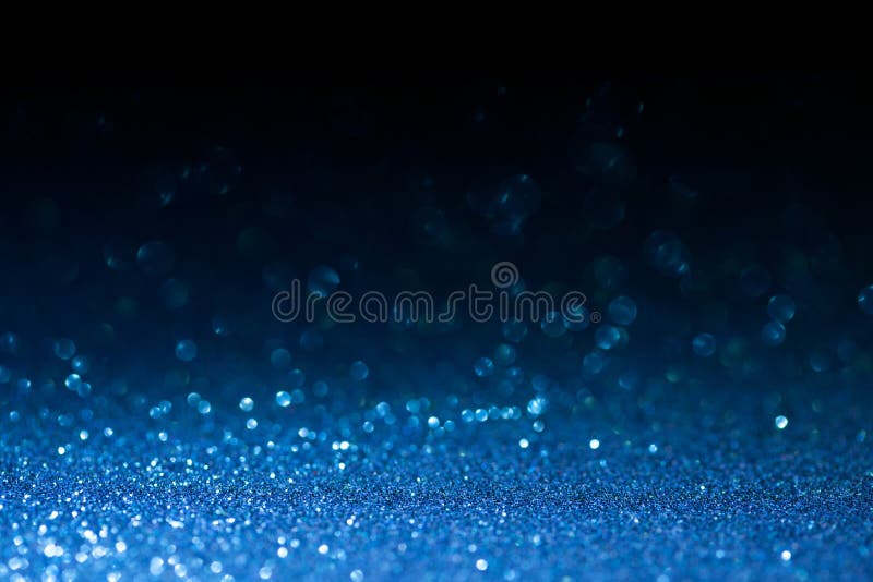 Deep blue glitter magic background. Defocused light and free focused place for your design. stock photography