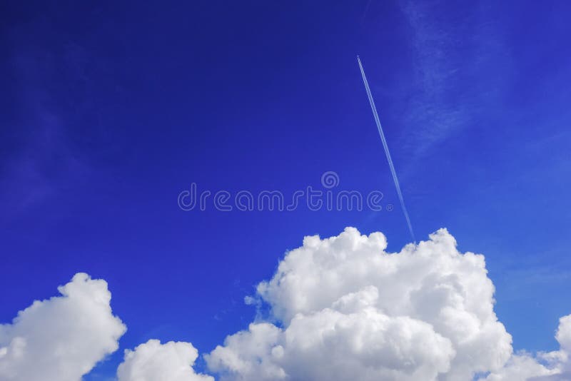 Aeroplane Flies Across the Sky Leaving White Trails. Stock Image ...