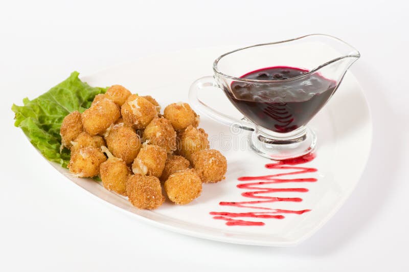 Deep fried cheese balls with sauce on white background Stock Photo by  ©RootsB4Branches 99676918