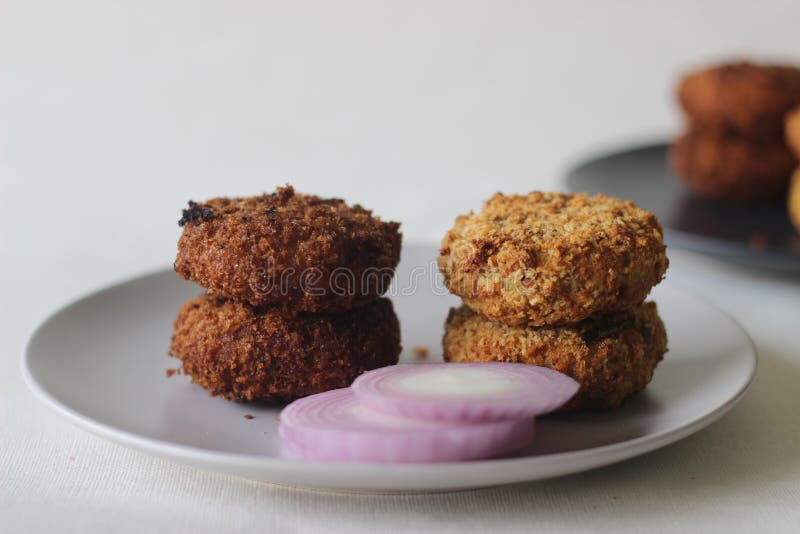 Deep Fried Chicken Cutlet on the Right Side and Air Fried Chicken