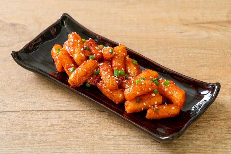 Deep Fried Korean Rice Cake Tteokbokki Skewered with Spicy Sauce Stock ...
