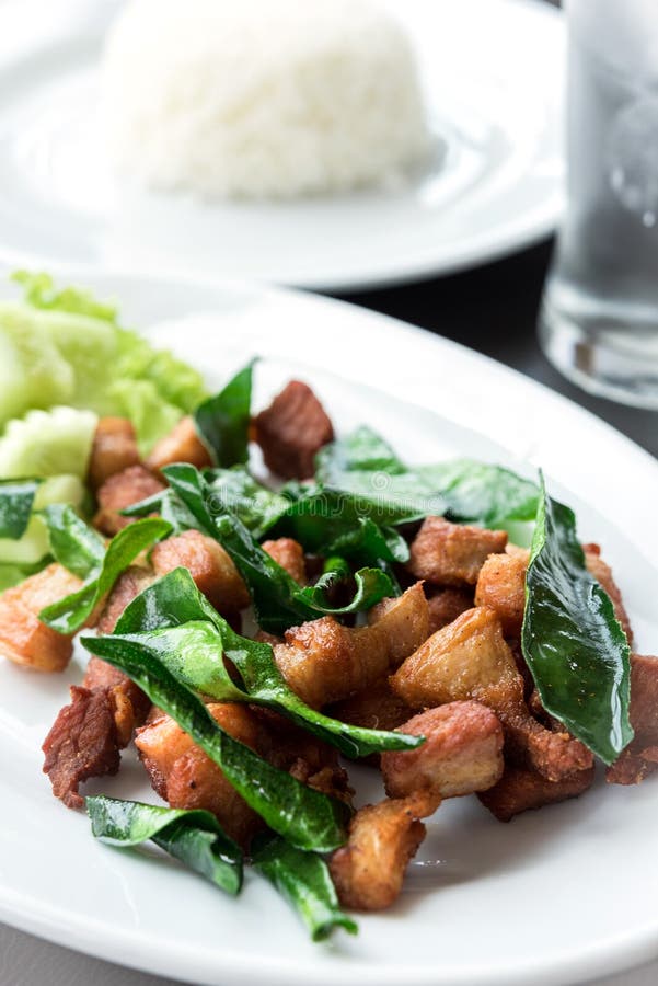 Deep Fried Pork with Leech Lime Leaf and Chili Sauce Stock Photo