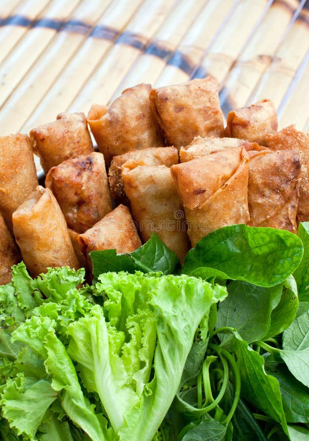 Deep fried spring rolls stock image. Image of wood, vegetables 24108375