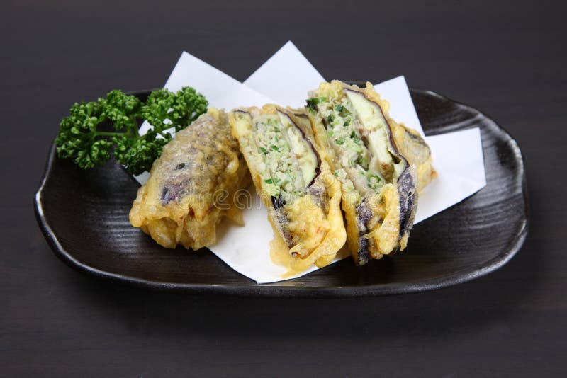 DeepFried Stuffed Eggplants on a Dining Table Stock Image Image of