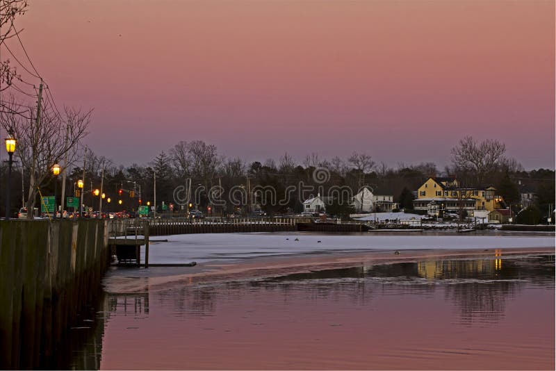 Deep Pink Sunset In Small Harbor