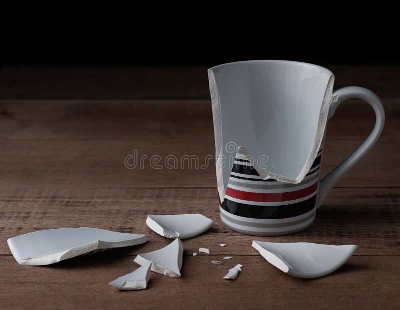 Broken cup on wooden background, Vintage style. Broken cup on wooden background, Vintage style