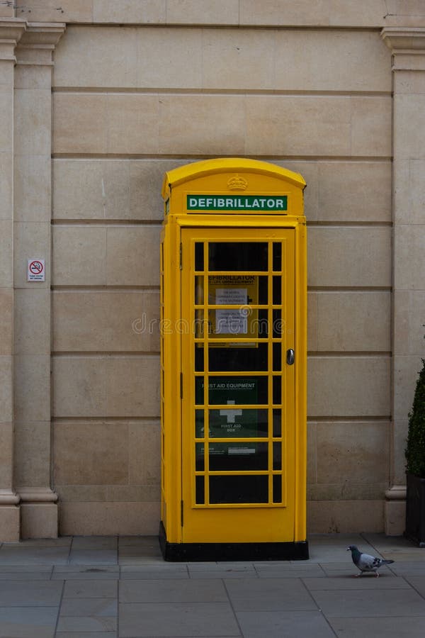 Yellow glass telephone booths with payphones are located on a pedestrian  street. Obsolete means of telephone communication in free access. Bialystok  Stock Photo - Alamy