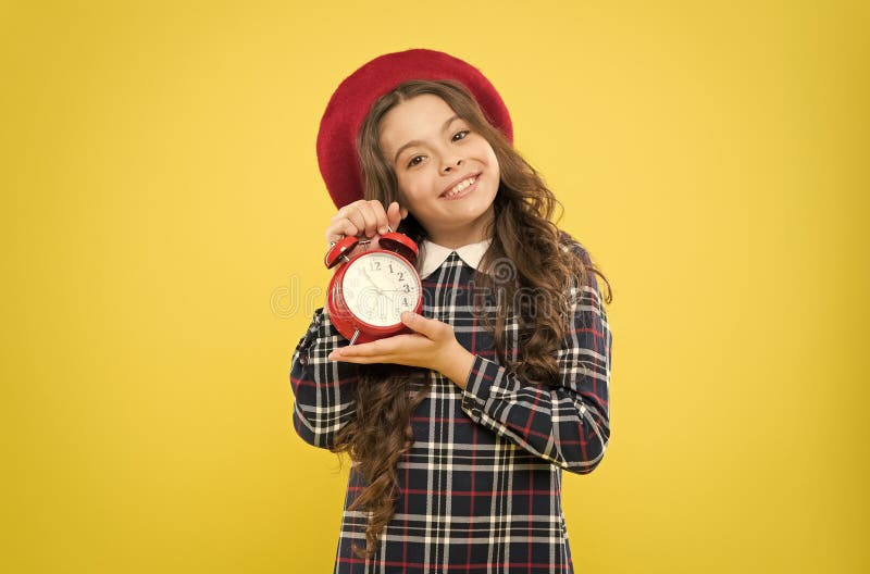 Define your own rhythm of life. Happy hours concept. Schedule and timing. Girl with alarm clock. Set up alarm clock royalty free stock images