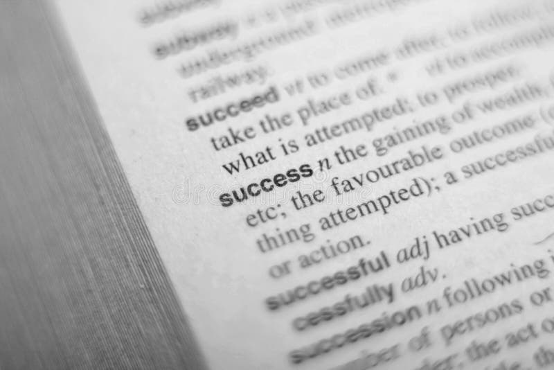 A definição do sucesso da palavra no dicionário imagens de stock royalty free A definição do sucesso da palavra no dicionário imagens de stock royalty free